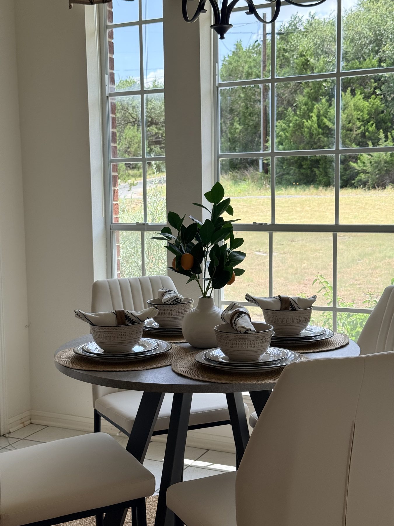 Highland Property Staging install — Sucha breakfast nook with Hill Country view