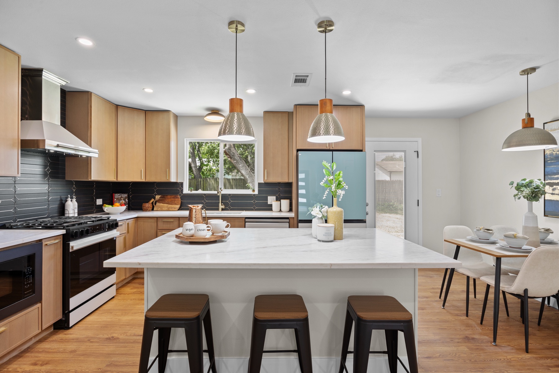 Highland Property Staging install — Paisano kitchen and dining area